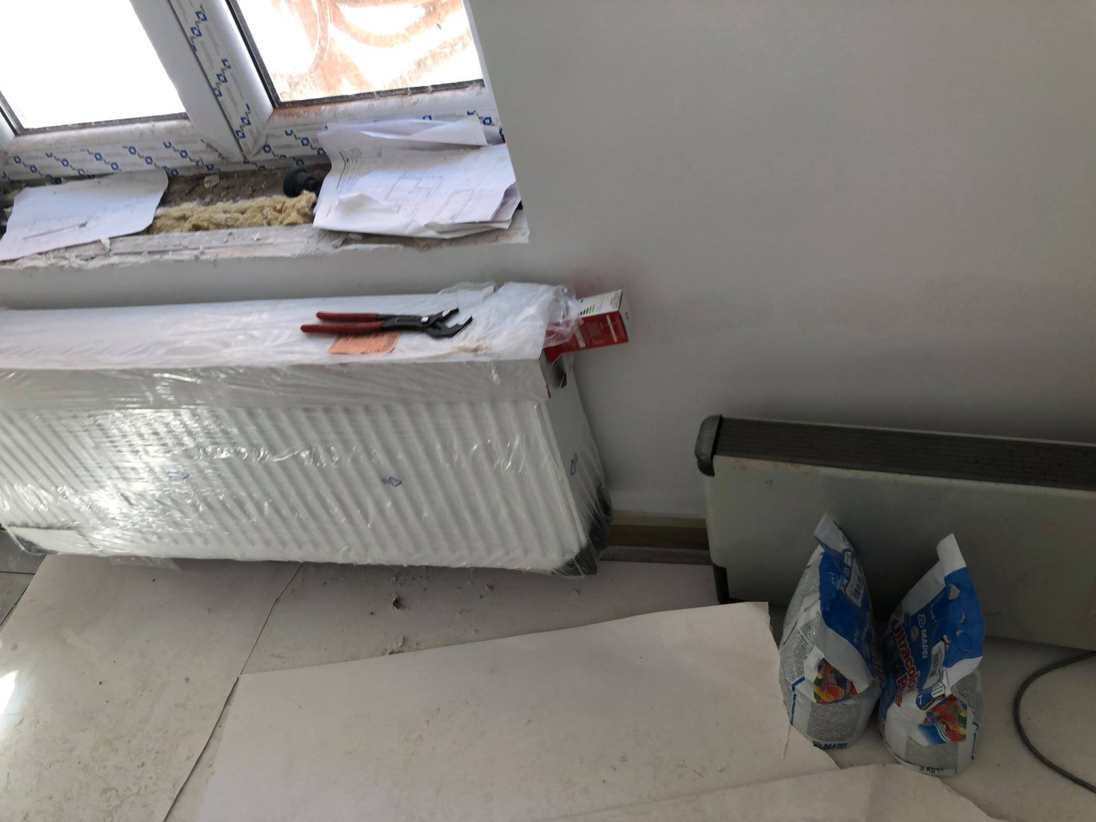 Vakman van Sanitair & CV Verwilt aan het werk bij een herstelling – loodgieter herstellingen Nijlen
